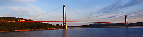 Suspension bridge Hoegakustenbron between Haernosand and Kramfors at dusk, 2nd longest suspension bridge of Scandinavia, Hoega Kusten, Vaesternorrland, Sweden, Europe