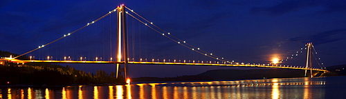 Suspension bridge Hoegakustenbron between Haernosand and Kramfors at night, 2nd longest suspensionbridge of Scandinavia, Vaesternorrland, Sweden, Europe