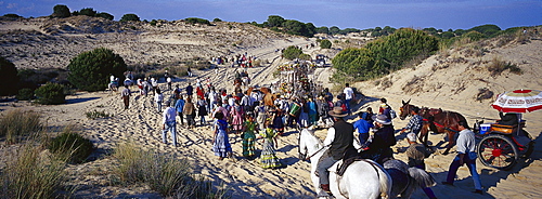 Pilgrims crossing the Donana National Park afoot and on horseback, Andalusia, Spain