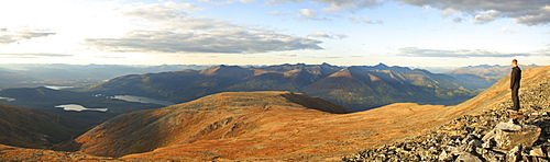 Person standing on Keno Hill overlooking Wernecke Mountains, Yukon