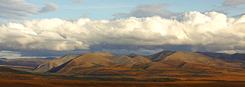 Panoramic image of the Richardson Mountains at the Arctic circle in fall colours, Demspter Highway, Yukon