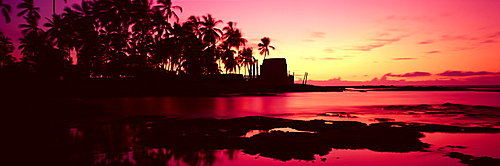 Hawaii, Big Island, Kona, Pu'uhonua O Honaunau (Place of Refuge) at sunset, panoramic .