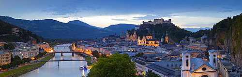 Hohensalzburg Fortress and Alt Stadt illuminated at dusk, Salzburg, Salzburger Land, Austria, Europe