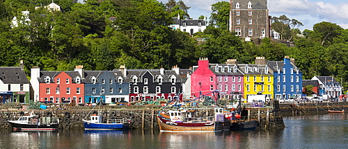 Multi-coloured buildings on the waterfront at Tobermory the capital of the Isle of Mull, Inner Hebrides, Scotland, United Kingdom, Europe