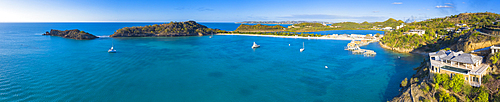 Aerial view by drone of Caribbean Sea surrounding Deep Bay, Antigua, Leeward Islands, West Indies, Caribbean, Central America