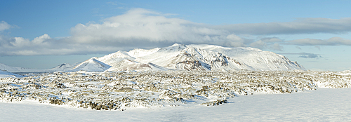 Frozen Lake Selvallavatn and snow covered lava field, Iceland, Polar Regions