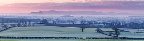 Panoramic view of Beeston Castle and the Peckforton Hills on a frosty winter morning over the Cheshire plain, Cheshire, England, United Kingdom, Europe