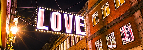 Alternative festive Christmas lights in Carnaby Street, Soho, London, England, United Kingdom, Europe