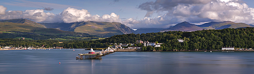 Bangor Pier and the Menai Strait backed by the Carneddau and Glyderau Mountains of Snowdonia or Eryri in summer, Anglesey, North Wales, UK