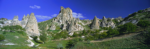 Panoramic view of ancient cave dwellings in the volcanic tufa formations, Uchisar, Cappadocia, Anatolia, Turkey, Asia Minor, Asia