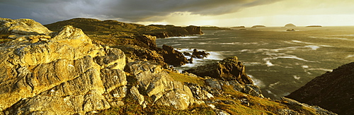 Stormy evening light on coastline near Carloway, Isle of Lewis, Outer Hebrides, Scotland, United Kingdom, Europe