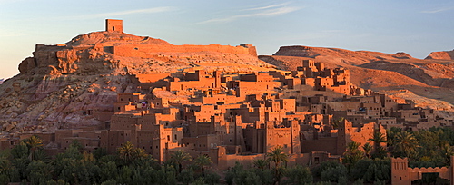 The ancient mud brick buildings of Kasbah Ait Benhaddou bathed in golden morning light, UNESCO World Heritage Site, near Ouarzazate, Morocco, North Africa, Africa