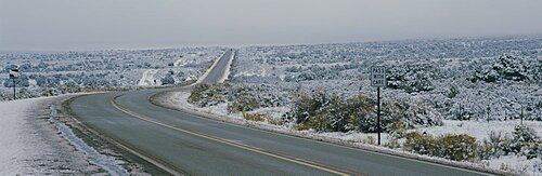 Two lane highway on a landscape, Taos, New Mexico, USA