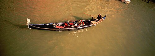 High angle view of tourists in a gondola, Venice, Italy