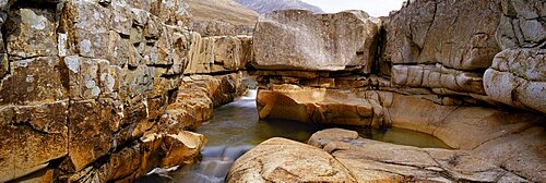 River flowing through a rocky landscape, Glen Etive River, Scotland