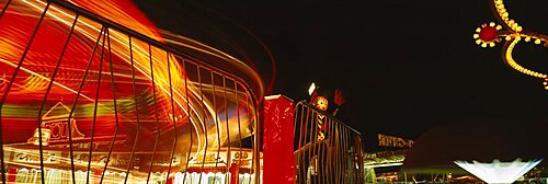 Carousel lit up at night in a carnival, Gloucester, Massachusetts, New England, USA