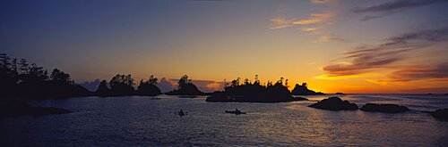 Silhouette of kayaks in the sea, Clayoquot Sound, Vancouver Island, British Columbia, Canada