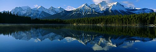 Reflection of mountains on water, Herbert Lake, Banff National Park, Alberta, Canada