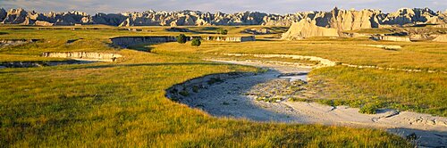 Rock formations on a landscape, Palmer Creek, Badlands National Park, South Dakota, USA