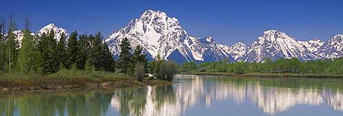 Reflection of a mountain range in water, Oxbow Bend, Grand Teton National Park, Wyoming, USA