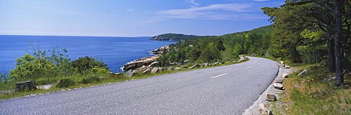 Empty road along an ocean, Acadia National Park, Maine, USA