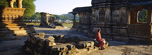 Portrait of a woman sitting in a temple, Erklinji Temple, Rajasthan, India