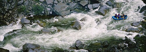 High angle view of a group of people doing white water rafting, Salmon River, California, USA