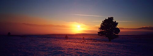 Sunset over a snow covered landscape, Lewis and Clark County, Montana, USA