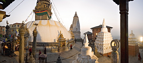 A panorama formed of three frames giving a very wide angle view, taken at dawn at the Buddhist stupa of Swayambu (Swayambhunath) (Monkey Temple), overlooking the Kathmandu valley, UNESCO World Heritage Site, Kathmandu, Nepal, Asia