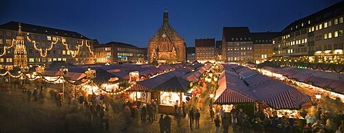 GERMANY Nuremberg Panoramic view of the Christmas Market in Hauptmarkt with The Frauenkirche behind.   Festive Advent Yuletide Travel Holidays Panorama