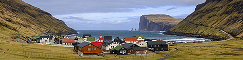 Panorama of the pretty coastal village of Tjornuvik on the island of Streymoy, Faroe Islands, Denmark, Europe