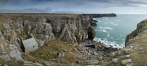 St. Govan's Chapel, nestled in the rugged cliffs of Pembrokeshire, Wales, United Kingdom, Europe