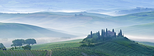 Dawn view of Val d'Orcia showing Belvedere and rolling Tuscan countryside, UNESCO World Heritage Site, San Quirico d'Orcia, Tuscany, Italy, Europe