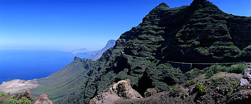 View from Route GC200 on west coast, with Puerto de las Nieves in the distance, Gran Canaria, Canary Islands, Spain, Atlantic Ocean, Europe