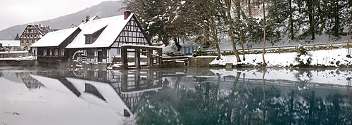 Mill reflected in the Blautopf spring, Blaubeuren, Swabian Alb, Baden-Wuerttemberg, Germany, Europe