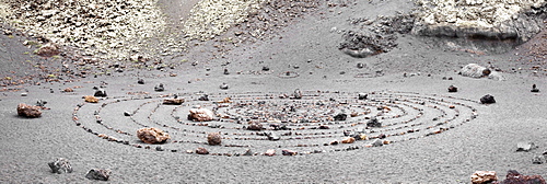 Stone circle inside the extinct volcano of Monte del Cuevo, Parque Natural de los Volcanos, Lanzarote, Canary Islands, Spain, Europe