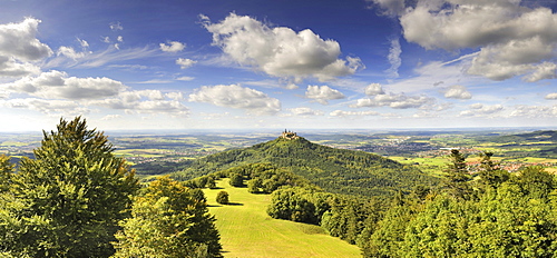 View over the Zellerhornwiese pasture on Burg Hohenzollern castle from Mt. Zeller Horn, Zollernalbkreis county, Baden-Wuerttemberg, Germany, Europe