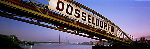 Pier on the Rhine with "Duesseldorf" lettering in the evening light, Duesseldorf on the Rhine, North Rhine-Westphalia, Germany, Europe