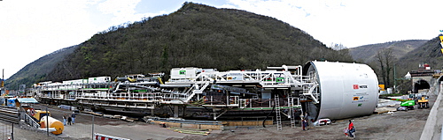 A giant tunnel boring machine of the specialist firm Herrenknecht, length 90 meters, bore diameter more than 10 meters, in front of the construction site of the second tube of the Kaiser Wilhelm Tunnel at the Ediger-Eller district, Rhineland-Palatinate, G