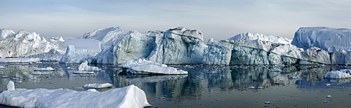 Icebergs in the midnight light, Disco Bay, West Greenland, Greenland