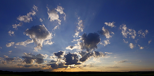 Sunset with cloudy atmosphere, summer, Germany, Europe