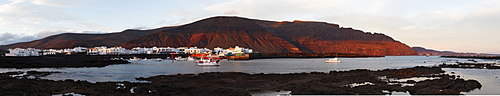 Panorama of the harbour of orzola with Risco de Famara, morning mood, Lanzarote, Canary Islands, Spain, Europe