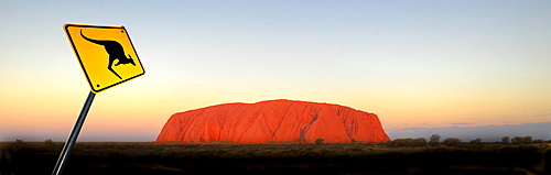 Panorama, kangaroo warning sign, Uluru, Ayers Rock at sunset, Uluru-Kata Tjuta National Park, Northern Territory, Australia