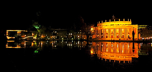 Night shot of the Staatstheater state theater, Opera House, also called Grosses Haus, reflection in the Eckensee lake, Stuttgart, Baden-Wuerttemberg, Germany, Europe