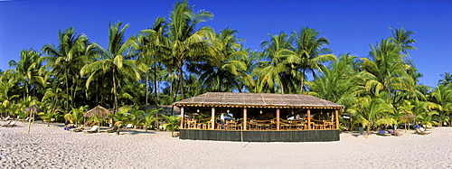 Restaurant on a palm beach, Ngapali Beach, Thandwe, Rakhine Coast, Bay of Bengal, Burma, Myanmar, Asia