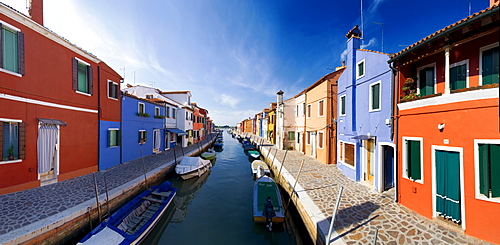 Panoramic view of the city and the colorfully painted houses and canals of Burano, Venice, Italy, Europe