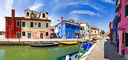 Panoramic view of the city and the colorfully painted houses and canals of Burano, Venice, Italy, Europe