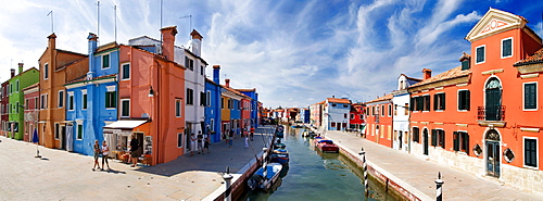 Panoramic view of the city and the colorfully painted houses and canals of Burano, Venice, Italy, Europe