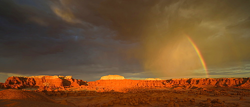 Panoramic view, rainbow during a thunderstorm, eroded entrada sandstone hoodoos and rock formations, Goblins, Goblin Valley State Park, San Rafael Reef Desert, Utah, Southwestern USA, USA