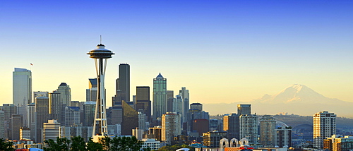 Early morning skyline, Seattle financial district with Space Needle, Mount Rainier at back, Columbia Center, formerly Bank of America Tower, Washington Mutual Tower, Two Union Square Tower, Municipal Tower, formerly Key Tower, U.S. Bank Center, Seattle, W